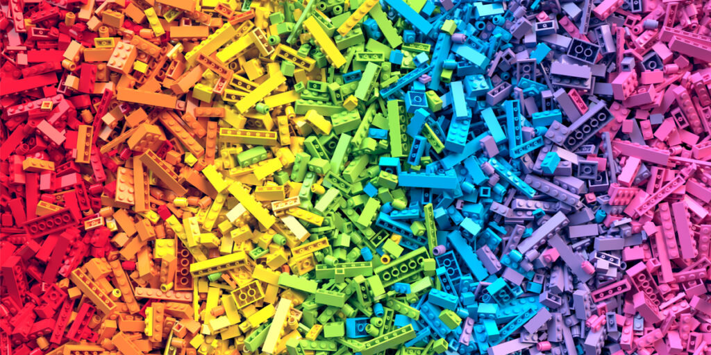 Sell your LEGO A huge pile of LEGO forming a colourfull columns of rainbow